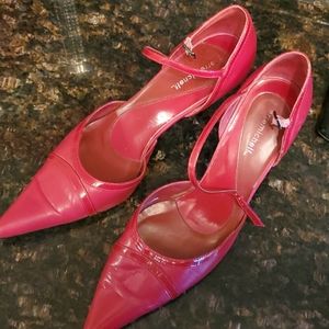 Red leather pumps